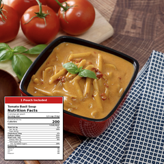 A red square bowl filled with tomato basil soup, styled with fresh tomatoes, basil leaves, and a blue patterned napkin on a wooden table. A nutrition facts label overlay is visible in the lower left corner.